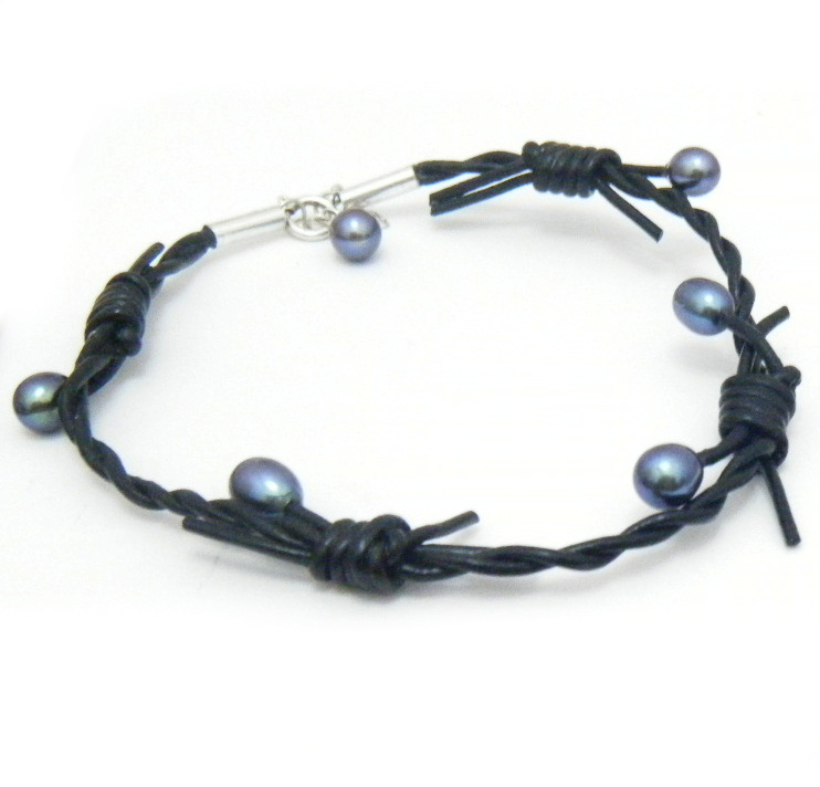 Blue Black Elliptical Pearls on Leather